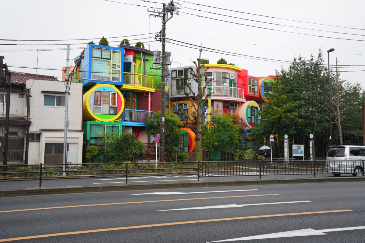 The Reversible Destiny Lofts as they are seen from the street as colorful, stacked shapes.