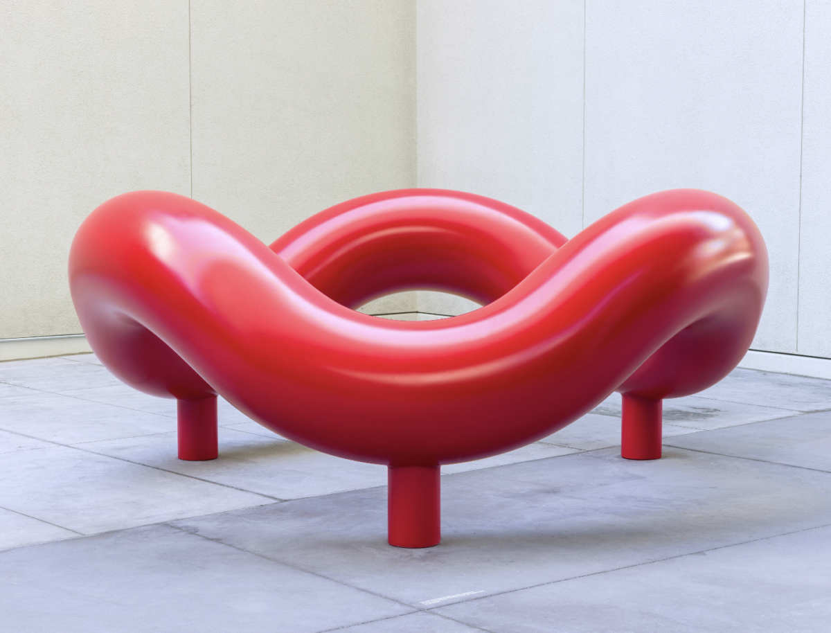 A red tubular sculpture | Public Art Installations