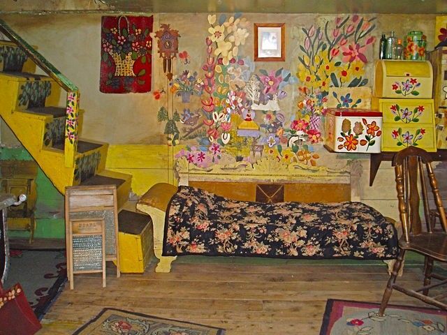 floral paintings on the walls and furnishings.