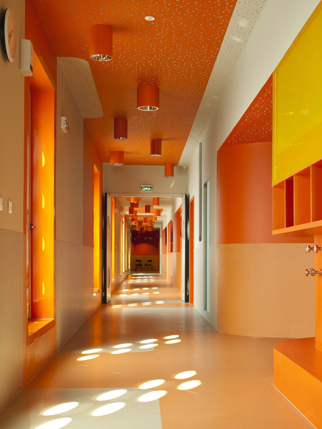 An intensely colored orange hallway.