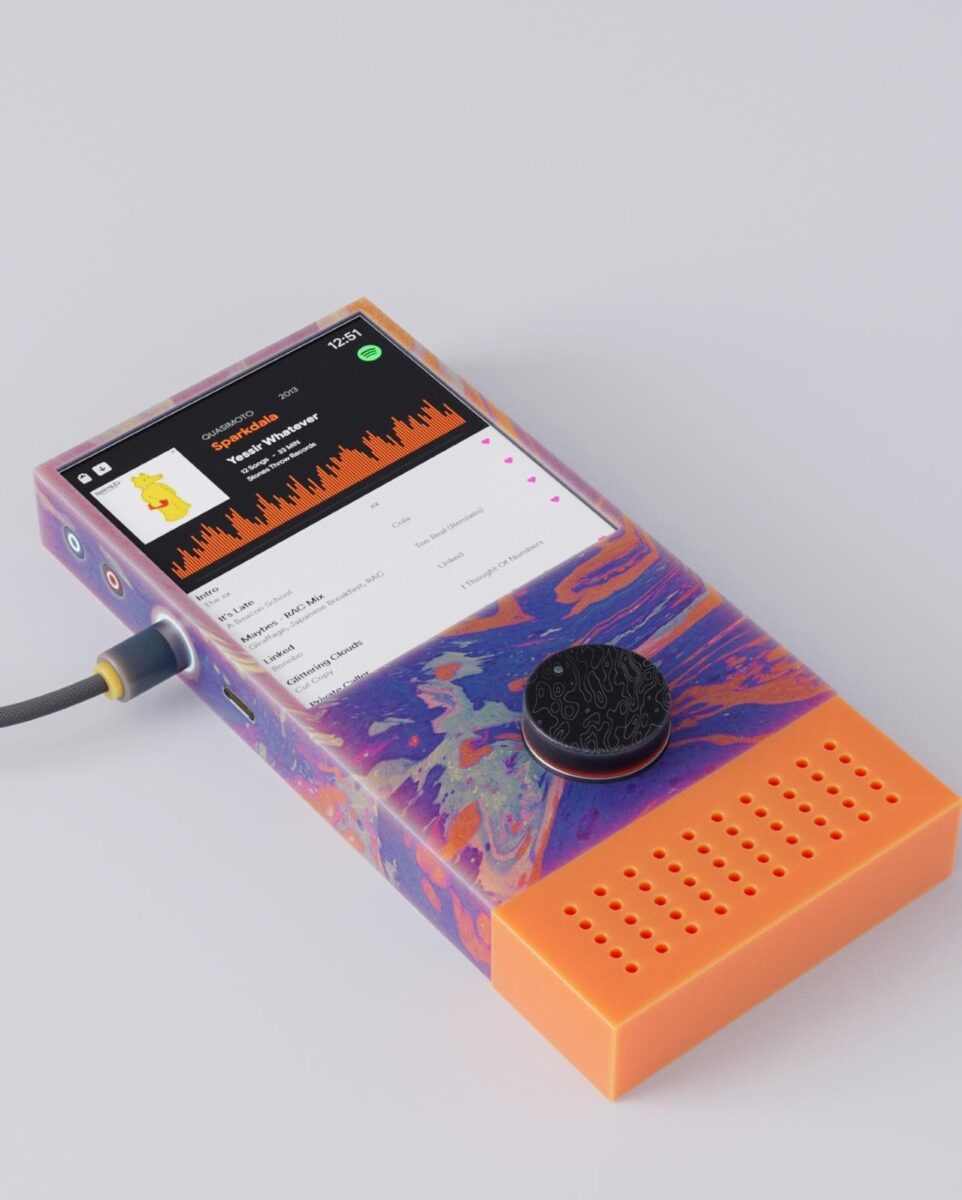 A speaker that looks like an old mp3 player with a marbled purple exterior and orange components. 